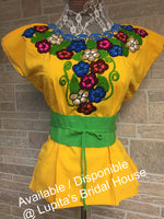 Artisanal embroidered blouse with fashion belt